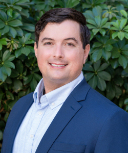 Our team member, Professional headshot of Steve Trottier, Multifamily Advisor and Apartment Consultant at ACI Apartments, wearing a blazer and smiling confidently.