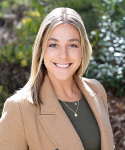 Our team member, Professional headshot of Christina Labowicz, Majority Owner & CEO of ACI Apartments, wearing a blazer and a warm, approachable smile.