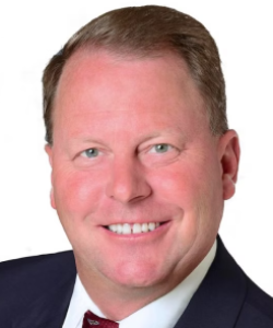 Professional headshot of Terry Taylor, Multifamily Advisor and Apartment Consultant at ACI Apartments, wearing a suit and exuding a warm, professional demeanor.